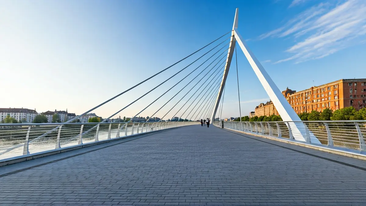 Diseño conceptual de una pasarela peatonal y ciclista sobre un río en un entorno urbano.